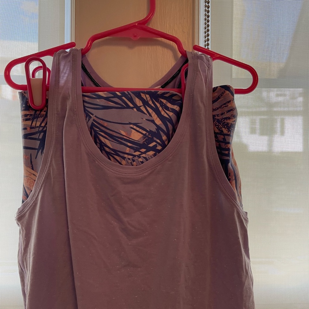Size 10 (girls) Iviva by Lululemon slightly worn top, pants in great condition
